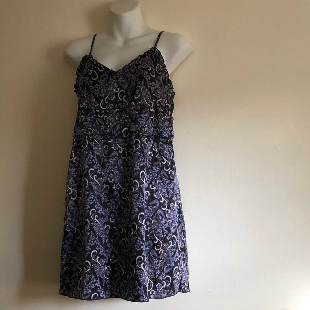 Black, lavender and white chemise with adjustable straps.